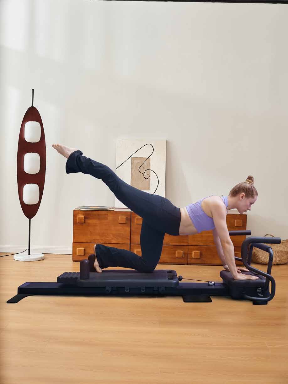 Exercice de Pilates sur le reformer connecté RS02
